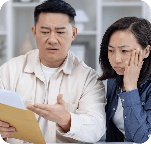 Man and woman looking at lawyer documents